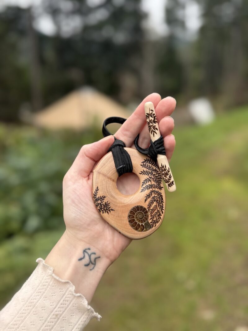 Madrone wooden toggle with ammonite - finished with lacquer